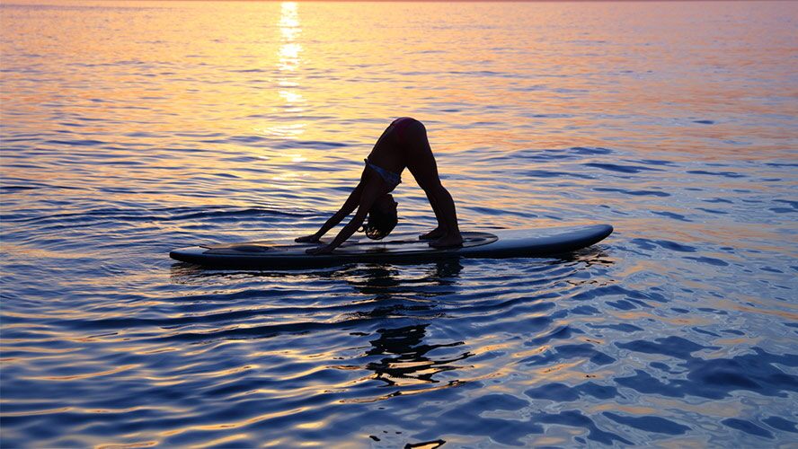 yoga paddle surf