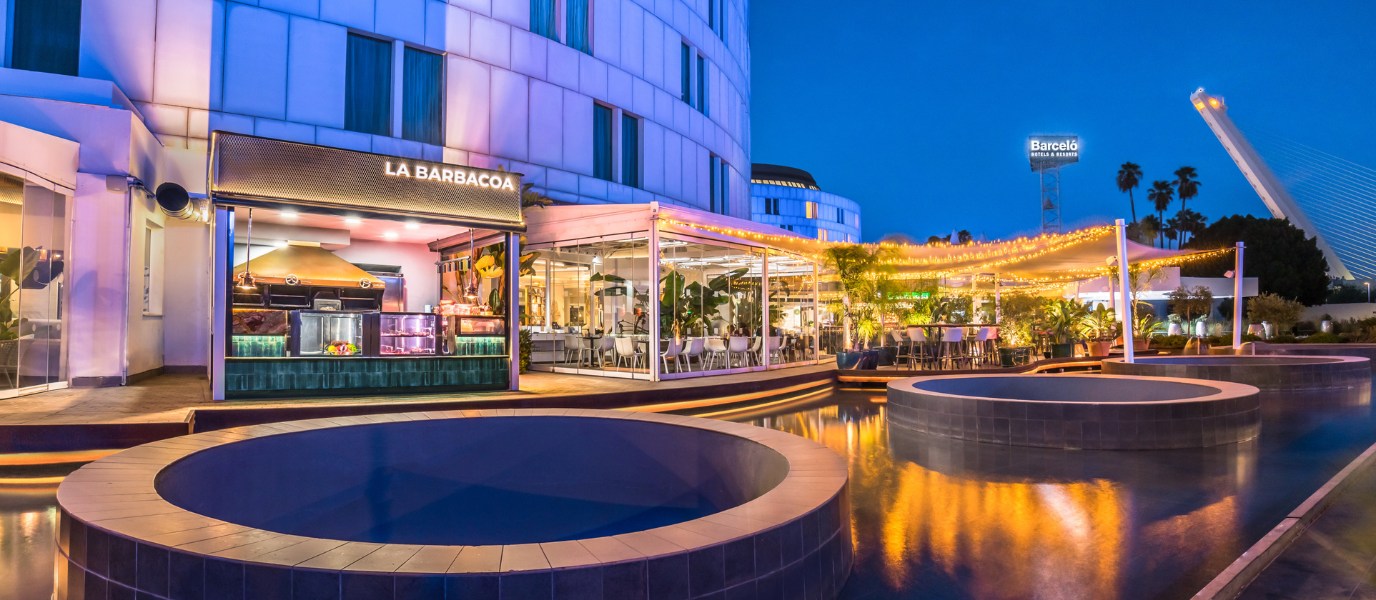 Conoce los mejores Day Pass Sevilla: piscinas entre jardines del Guadalquivir y desayunos que alargan la mañana